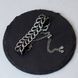 Leaf motif with palladium