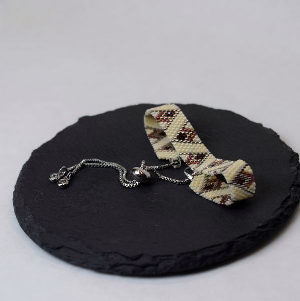 Bordo-beige bracelet with palladium corners