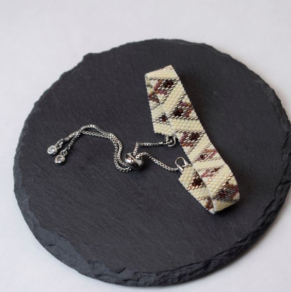 Bordo-beige bracelet with palladium corners