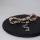 Red-beige bracelet with palladium corners