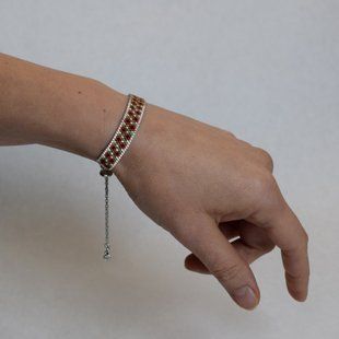 Red flower bracelet with palladium