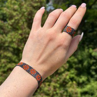 Bracelet with stars orange-gunmetal