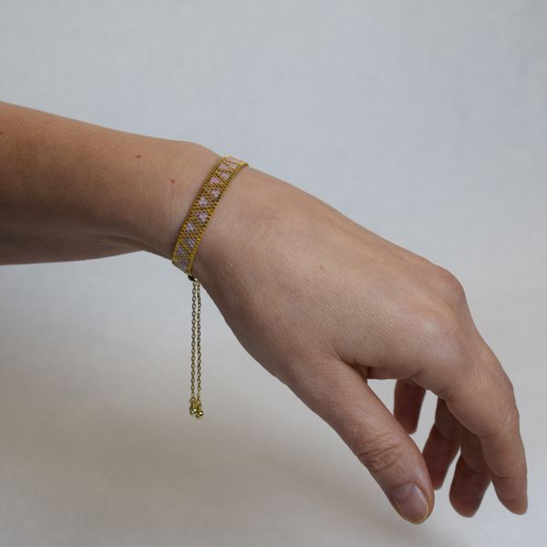 Pink geometric bracelet with gold