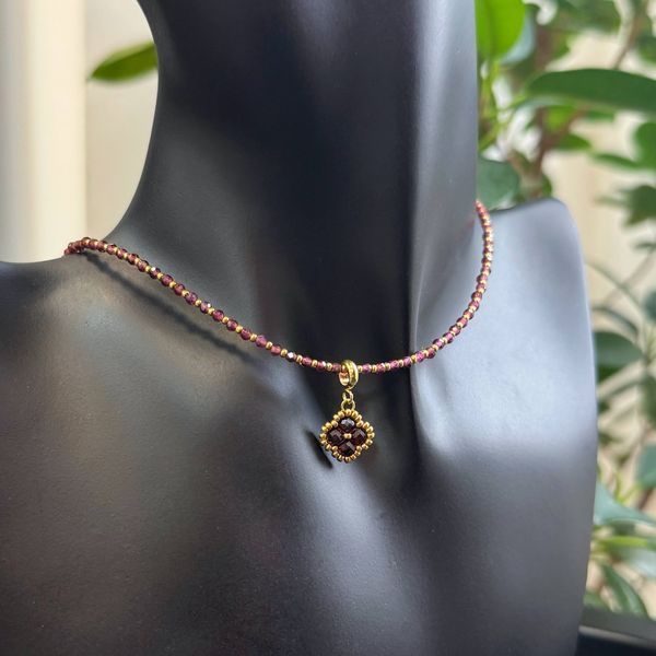 "Garnet Talisman" on gold