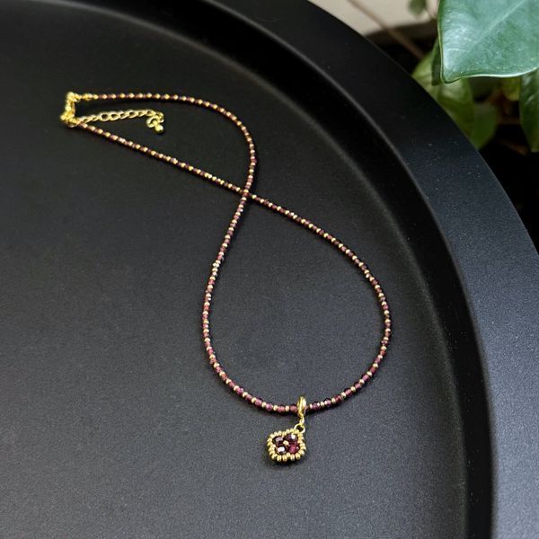 "Garnet Talisman" on gold